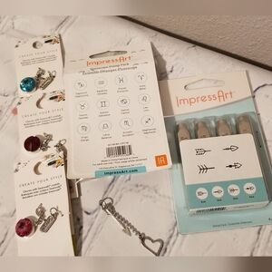 Impress Art Stamps Sets, Swarovski Crystal Charms, And 10 Heart&Arrow Charms